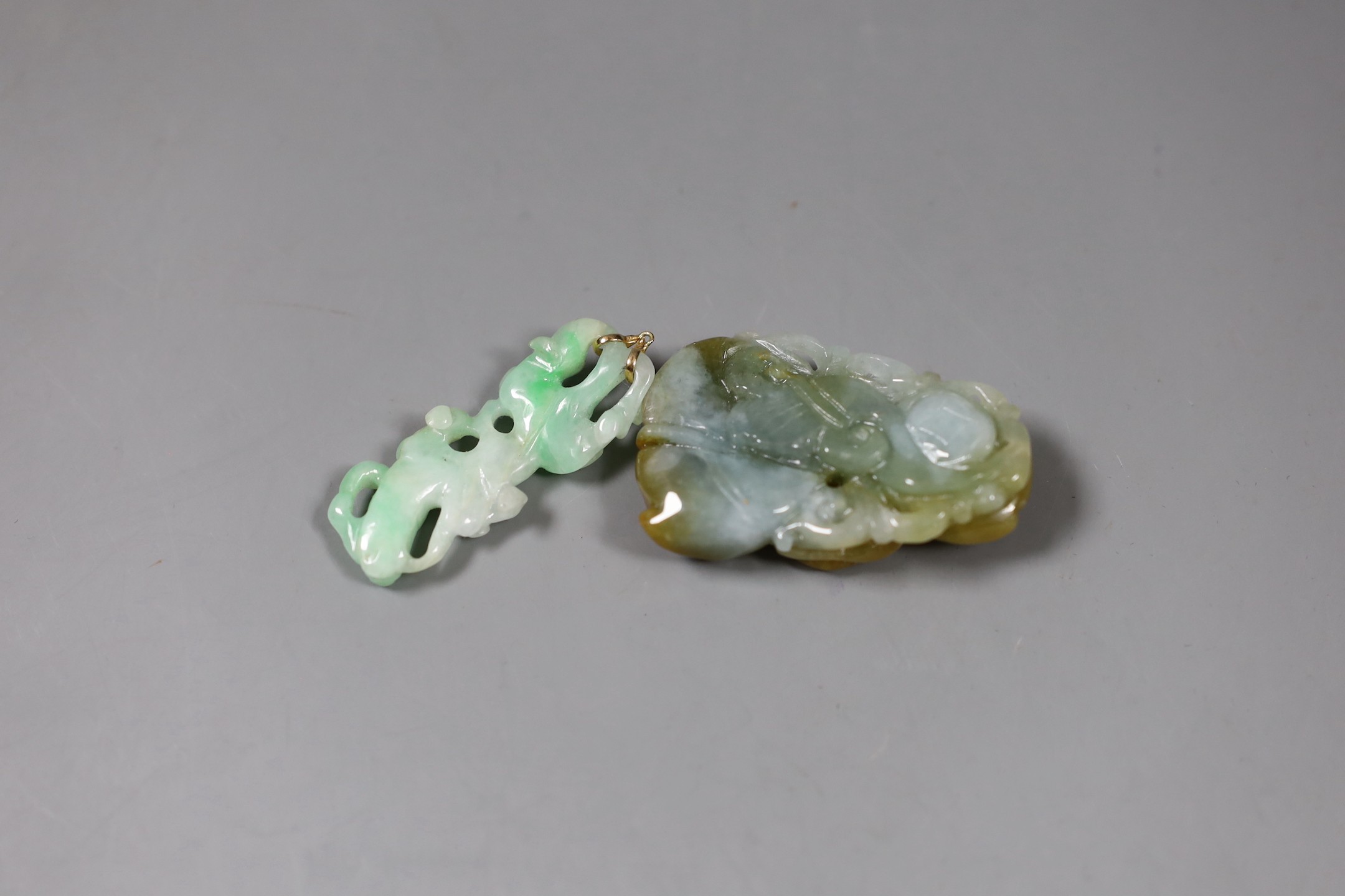 Two Chinese jadeite carvings, one mounted as a pendant, largest 4.7 cm